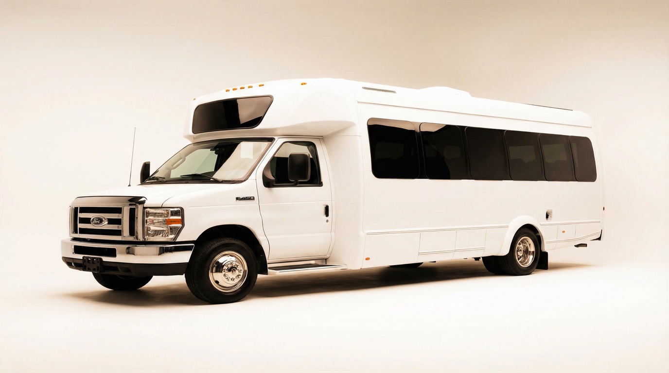 White 14-passenger luxury party bus (E-450) exterior with limo-style bench seating for Wilmington weddings, celebrations, and brewery tours